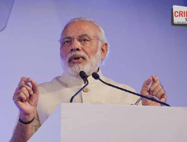 Narendra Modi, India's prime minister, speaks at the Advancing Asia Conference in New Delhi, India, on Saturday, March 12, 2016. Modi doubled down on India's commitment to macroeconomic stability, saying it has never devalued its currency to achieve growth and won't resort to cash handouts as a way to boost farmer income. Photographer: Kuni Takahashi/Bloomberg *** Local Caption *** Narendra Modi