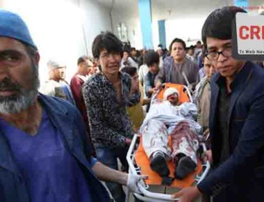 Afghans help a man who was injured in a deadly explosion that struck a protest march by ethnic Hazaras, at a hospital in Kabul, Afghanistan, Saturday, July 23, 2016. Afghan Health Ministry officials say tens of people have been killed and over 200 wounded in the bombing Saturday, that was claimed by the Islamic State group according to a statement posted on the IS-linked Aamaq online news agency. The protesters Saturday were demanding that a major regional electric power line be routed through their impoverished home province. (AP Photo/Rahmat Gul) (AP Photo/Rahmat Gul)