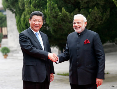 XI AN, CHINA - MAY 14:  (CHINA OUT) Chinese President Xi Jinping (L) shakes hands with Indian Prime Minister Narendra Modi during their visit to Daci'en Temple on May 14, 2015 in Xi'an, China. Modi is on a three-day state visit to China. It is the first time that President Xi Jinping has hosted a foreign leader in his hometown of Xi'an.  (Photo by Sheng Jiapeng/CNSPHOTO/ChinaFotoPress via Getty Images)