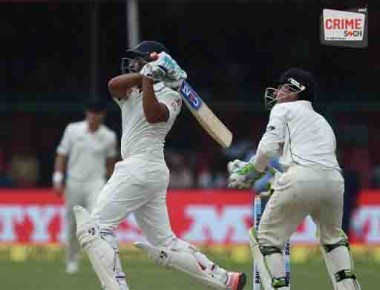 New Zealand's B. J. Watling (R) watches as India's Rohit Sharma plays a shot during the first day of the first cricket test match between India and New Zealand at Green Park Stadium in Kanpur on  September 22, 2016. ----IMAGE RESTRICTED TO EDITORIAL USE - STRICTLY NO COMMERCIAL USE----- / AFP PHOTO / PRAKASH SINGH / ----IMAGE RESTRICTED TO EDITORIAL USE - STRICTLY NO COMMERCIAL USE----- / GETTYOUT