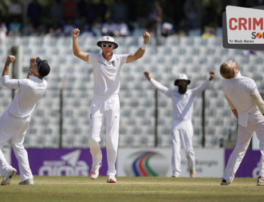 From left to right, England's Joe Root, Stuart Broad, Moeen Ali, and Ben Stokes celebrate the dismissal of Bangladesh's Taijul Islam on the final day of their first cricket test match in Chittagong, Bangladesh, Monday, Oct. 24, 2016. (AP Photo/A.M. Ahad)