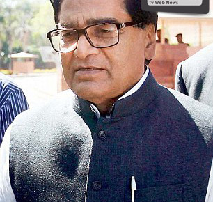 New Delhi:  Samajwadi Party MPs Ram Gopal Yadav and Naresh Agarwal during the ongoing budget session at Parliament House in New Delhi on Friday. PTI Photo by Manvender Vashist(PTI3_1_2013_000086A)