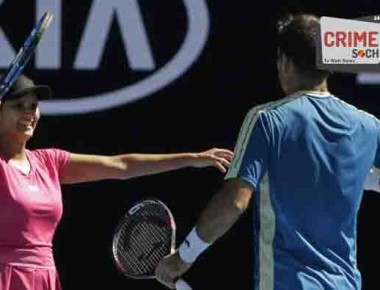 India's Sania Mirza, left, celebrates with Ivan Dodig of Croatia after winning their mixed doubles' semifinal against Australia's Samantha Stosur and Sam Groth at the Australian Open tennis championships in Melbourne, Australia, Friday, Jan. 27, 2017. (AP Photo/Aaron Favila)