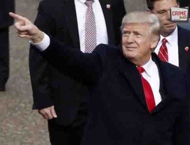 President Donald Trump points during the 58th Presidential Inauguration parade for President Donald Trump in Washington. Friday, Jan. 20, 2017 (AP Photo/Pablo Martinez Monsivais)