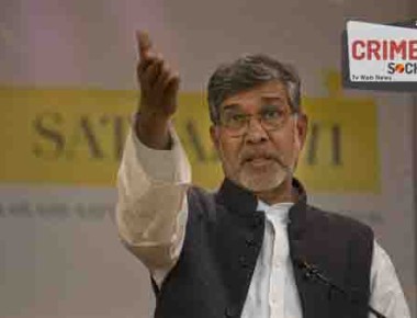 Nobel Peace Laureate Kailash Satyarthi gestures as he speaks during the launch of his book "Azad Bachpan ki Aor" in New Delhi, India, Thursday, Jan. 7, 2016. (AP Photo /Tsering Topgyal)