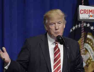 FILE - In this Monday, Feb. 6, 2017, file photo, President Donald Trump speaks to troops at MacDill Air Force Base in Tampa, Fla. In his speech, Trump falsely claimed that the news media often fails to cover terrorist attacks. The allegation echoes an accusation that has long gone unquestioned on Infowars, a website known for trafficking in dubious allegations of plots and cover-ups. While there’s no evidence that Trump gets his information from Alex Jones' Infowars site, Trump voiced his admiration for Jones when the Infowars host interviewed him in December 2015. (AP Photo/Susan Walsh, File)