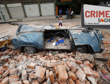 A van sits in a pile of rubble after it was smashed by a wall that collapsed during a massive earthquake, in Mexico City, Friday Sept. 8, 2017. One of the most powerful earthquakes ever to strike Mexico hit off its southern Pacific coast, killing at least 35 people, toppling houses, government offices and businesses. Mexico's capital escaped major damage, but the quake terrified sleeping residents, many of whom still remember the catastrophic 1985 earthquake that killed thousands and devastated large parts of the city. (AP Photo/Marco Ugarte)