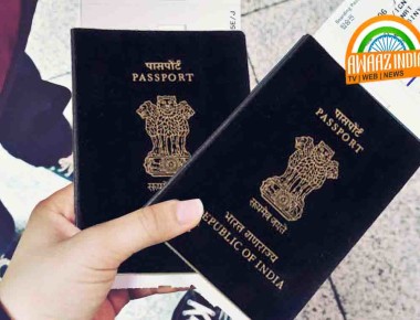 mid age man holding passport and boarding pass